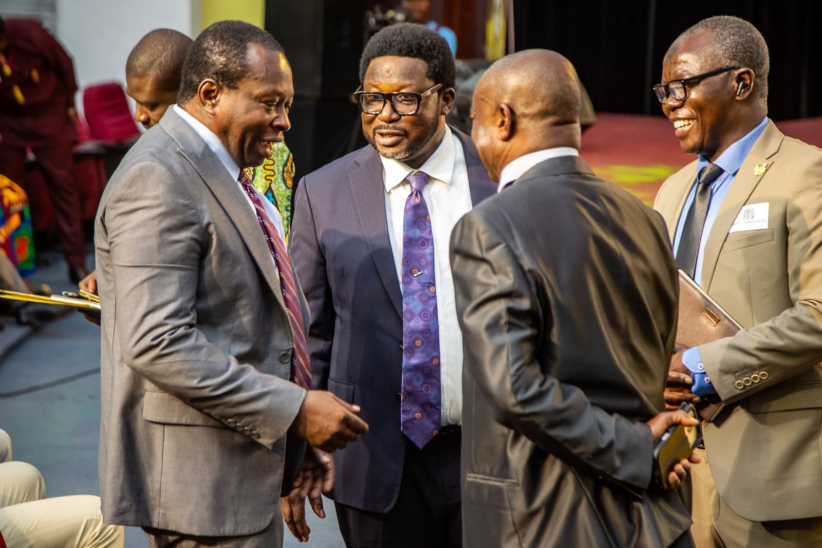 Chamber representatives and guests in conversation before the ceremony