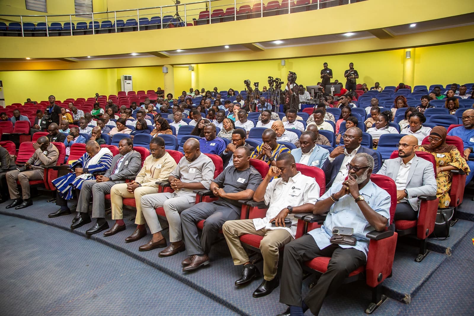 Members and guests fill the hall