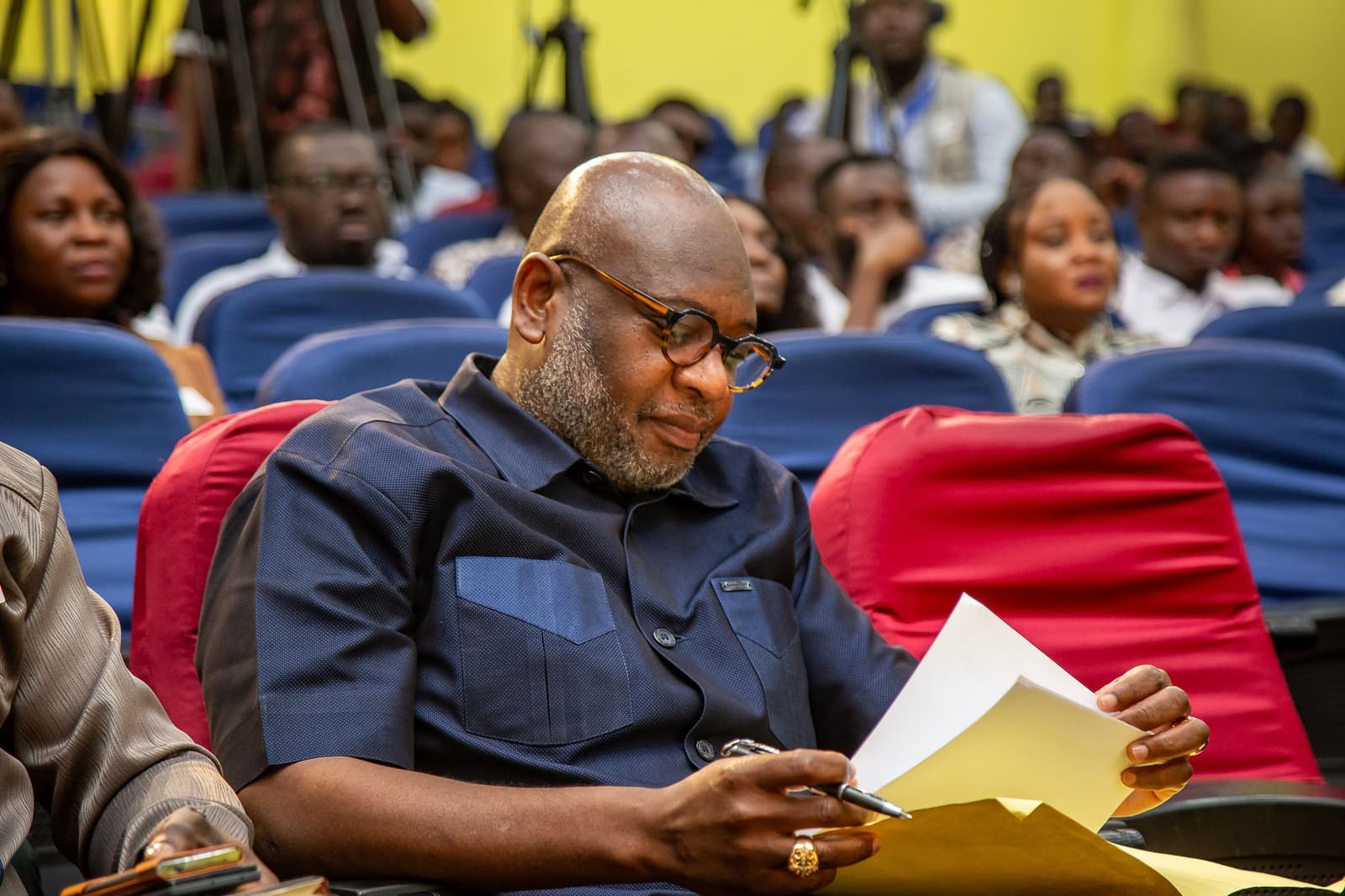 The Chief Executive of the Ghana Cocoa Board (COCOBOD) reviews his notes
